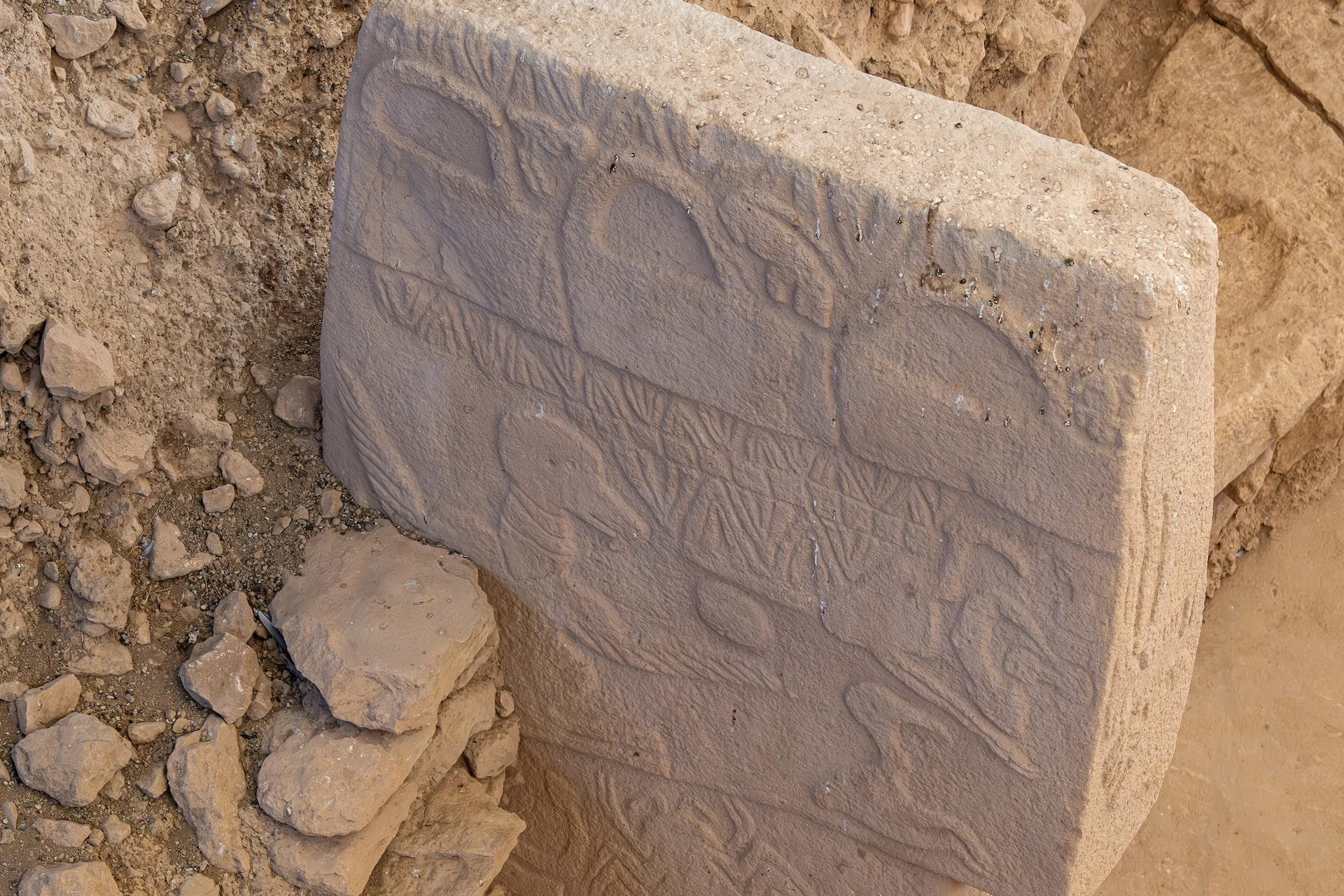 The Vulture Stone (Pillar 43) at Göbekli Tepe showing the headless figure beneath the great vulture — evidence of the site's ancestor and death cult