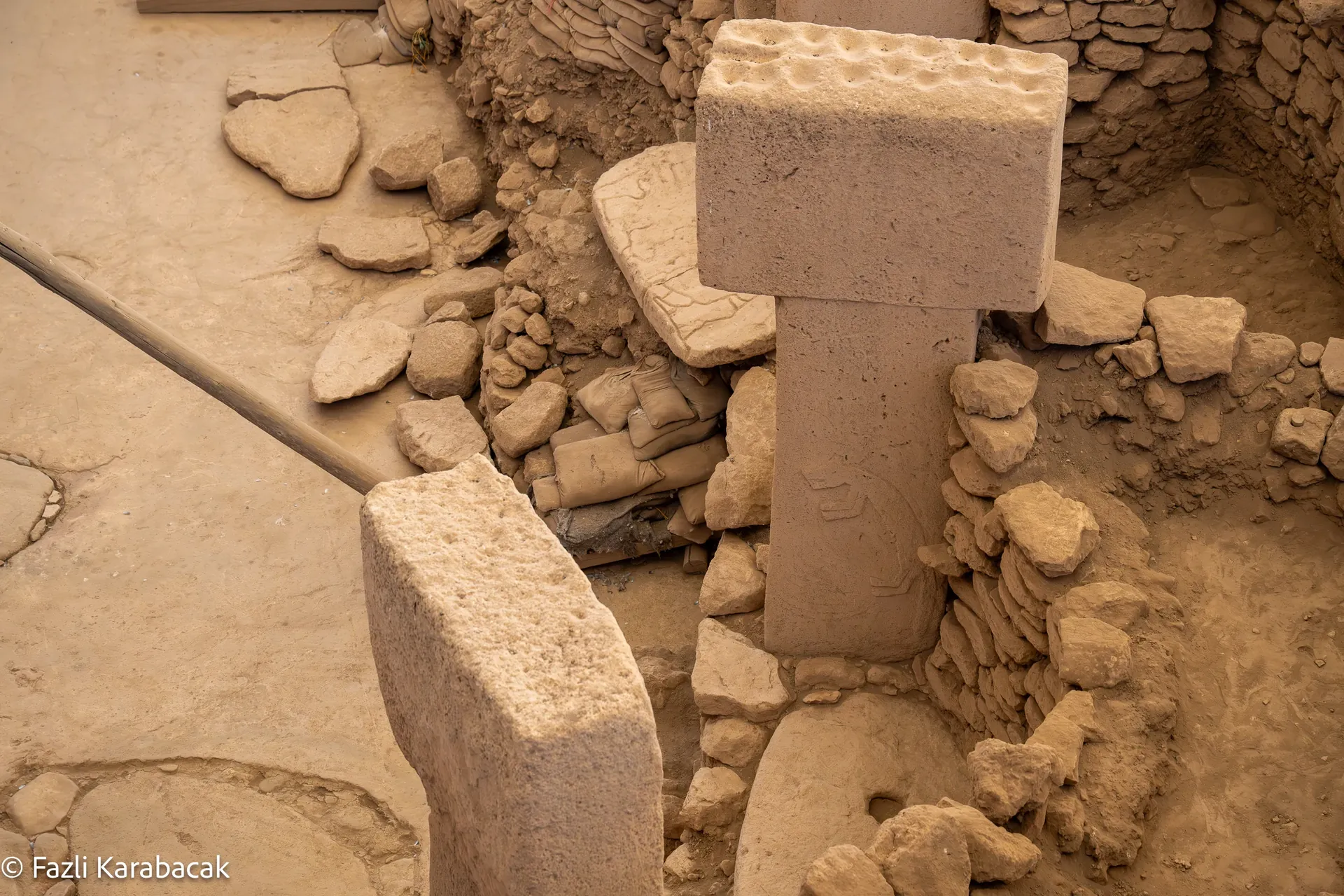 The quarry site with an unfinished pillar still attached to bedrock